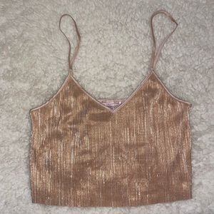 Like new medium shiny Victoria’s secret top light pink 100% polyester
